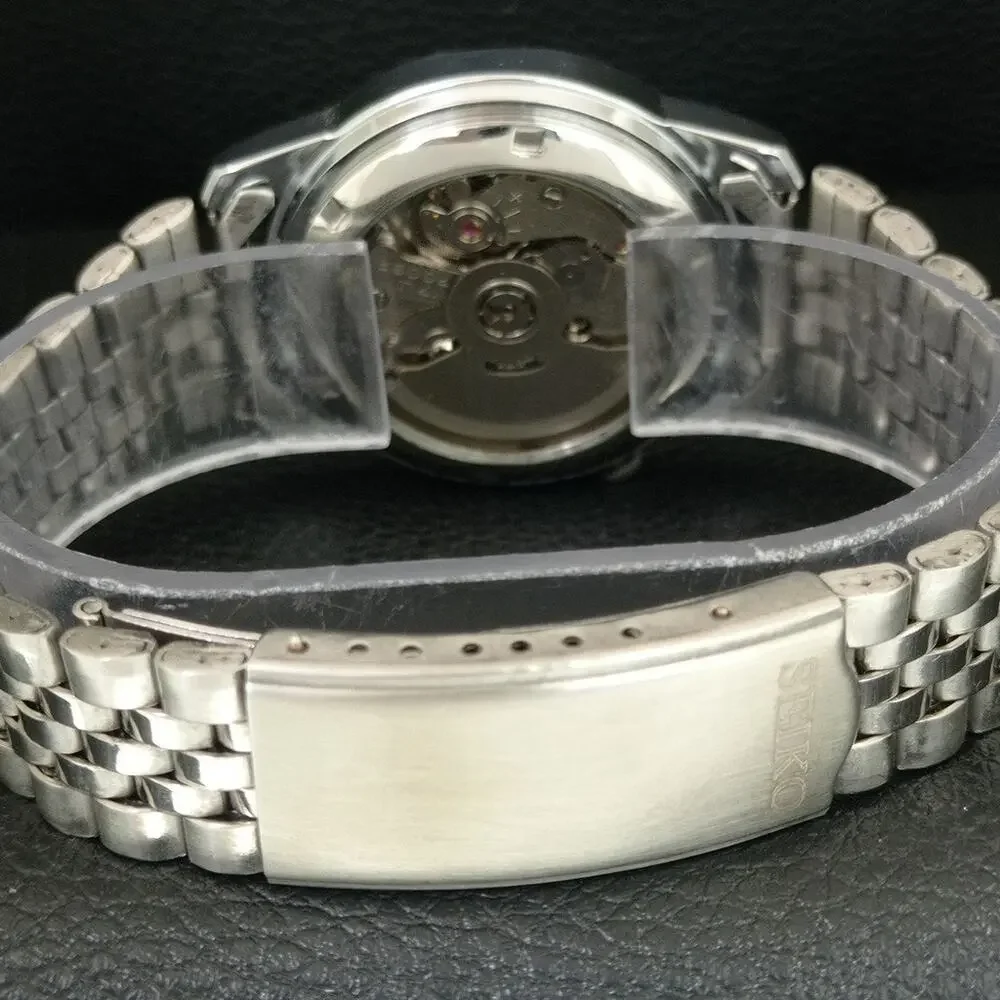 Vintage 1975 Seiko Automatic Mens Silver Watch W/daydate & White accents